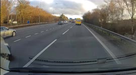 BMW dangerously cuts from Lane 4 M42 at Junction of M40 onto M40 nearly wiping out another car who had to swerve aggressively to avoid it