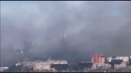 Mariupol shrouded in clouds of smoke as Ukraine refuses to surrender city