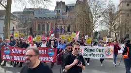 RMT Union members and P&O Ferries staff march through Parliament Square