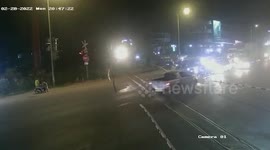 Bungling driver gets hit by oncoming train on level crossing in Cambodia