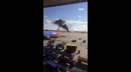 Plane on fire on the runway at Las Vegas airport