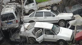 Numerous failed cars heap up just like tomb