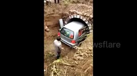 A real car buries with a man