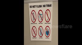 What CAN-not be put in the CAN!! No Flushing these items - the sign says!! Restaurant bathroom sign tells users what not to put in the toilet!!!