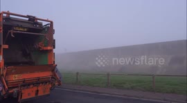 Thick fog blankets Sheerness beach in Kent, UK