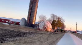 Controlled demolition of giant harvestore silo in La Harpe, USA