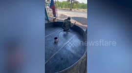 Satisfying ASMR video shows giant gong being made with hammers