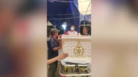 Strong winds hit temple during funeral in northern Thailand