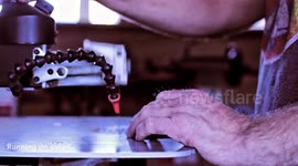 Woodworker using hand tools to inlay bowties in a wood slab to make a bench
