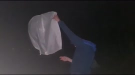 Letting off a large Lantern into the night sky in Buckinghamshire