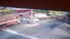 Auto-rickshaw keeps spinning in circles after being hit by trailer in southern India