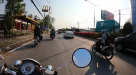 riding a 110cc motorbike at Thailand Chiangmai road in the afternoon