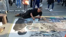 A London street artist takes a whole week to draw touching mural to show solidarity with Ukrainians