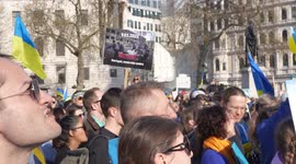 Anti war placard in a crowd at London Stands with Ukraine: March and Vigil