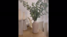 Woman makes trendy vase out of old FABRIC SOFTENER BOTTLE for £5