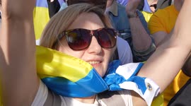 Close up of woman in a crowd at the London Stands with Ukraine: March and Vigil