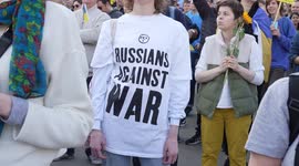 Woman with t shirt that says 'Russians against war' at the London Stands with Ukraine: March and Vigil