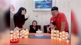 Girl bursts into tears after sister blows out birthday candle leaving parents in stitches