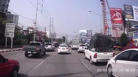 Concrete electricity post falls into road inches from hitting cars