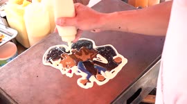 Will Smith Oscars slap on Chris Rock immortalised in cartoon PANCAKE by street food vendor