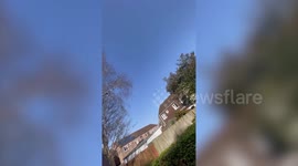 Dramatic moment hero passer-by leaps into action to rescue elderly man from burning house