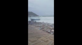 Huge waves sink dozens of boats anchored on the coast in Vietnam