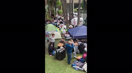 Hundreds of Ukrainian refugees make camp at Mexico border in hope of entering US