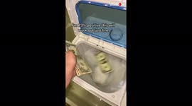 US woman shows way to make dirty money clean, by using a mini washer