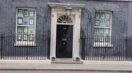 Snow lands in Downing St London today during a cold snap in the UK