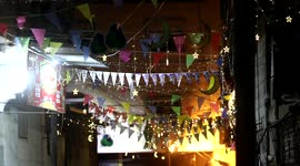 A Palestinian dawn awakener ''al-Musaharati'' Nezar al-Dabbas 50, walks through streets to wake up Muslims for a meal before sunrise during the fasting month of Ramadan, in Khan Younis in the southern of Gaza strip
