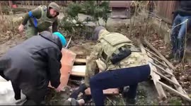Disturbing footage of Bucha resident burying daughter officials say was shot by Russian soldier