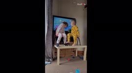 'Girl falls off table after being asked several times by her mom to get down '