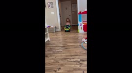 '1 y/o boy flips out of his dump truck after sister gives him a hard push  '