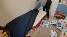 Mum's time saving hack making kids bed by putting 2 sets of covers and sheets.