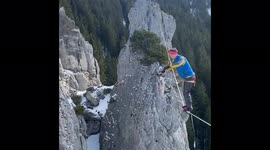 Crazy Kendama trick on a slackline hundreds of feet above the ground