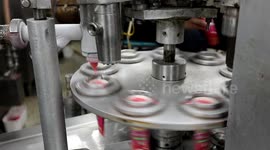 Palestinian workers work inside an ice cream factory during the Muslim holy month of Ramadan in Khan Younis in the southern Gaza Strip.
