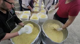 Palestinian Muslims participate in iftar the evening (breaking fast) meal during the fasting month of Ramadan, in the West Bank city of  Hebron.