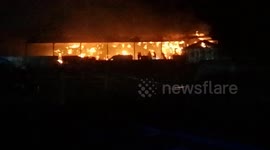 Massive fire consumes barn in English farm