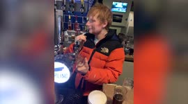 Ed Sheeran stuns customers by turning up at UK pub where he starts pulling pints and joining sing-alongs