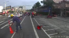 WTF MOMENT: Construction worker is fed up and throws traffic cones around (Dashcam Video)