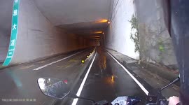 ROAD RAGE: Rider gets soaked after driver passes through a puddle (Dashcam Video)