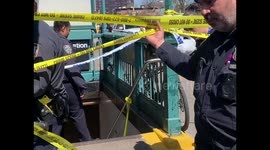 Police arrive to Brooklyn subway shooting scene