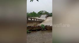 Bridge collapses after Tropical Storm Megi smashes into the Philippines