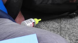 extinction  rebellion several protesters glue their hands  to the ground shells hq london