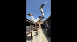 Parkour enthusiast left in shock after botching a bar swing jump