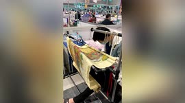 Shangai lockdown: man calms himself down with embroidery at makeshift hospital