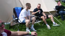 Campers drinking in the Bank Holiday sunshine at Chester Racecourse CamperFest