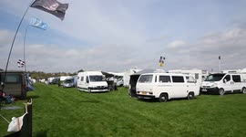 Campers drinking in the Bank Holiday sunshine at Chester Racecourse CamperFest