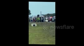 A van flipped on its side while driving down a street in South Florida!!