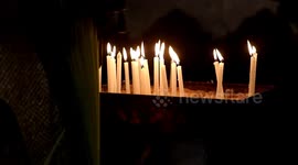 Palestinian Christians attend an Orthodox Palm Sunday, at the Church of Saint Porphyrius